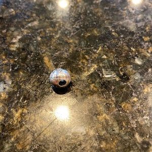 silver world clasp charm